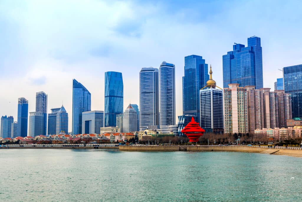 Scenic view of Corniche Abu Dhabi with its beautiful waterfront, modern high-rise buildings, and lush green parks