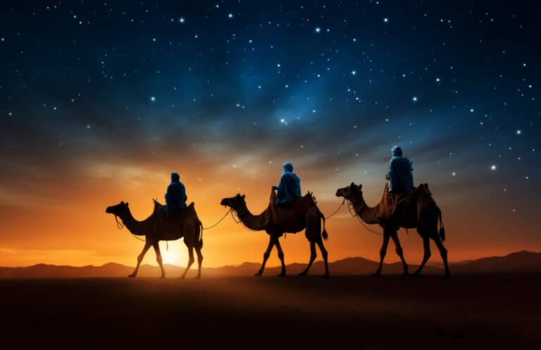 Enjoying a camel ride during an evening desert safari with a beautiful sunset and sand dunes in the background